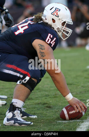 Nebraska defensive tackle Ndamukong Suh #93 and Arizona center Colin Baxter  #64 mix it up during game action in the Pacific Life Holiday Bowl at  Qualcomm Stadium San Diego, CA. Nebraska defeated