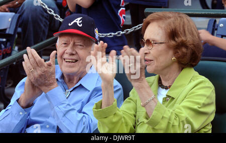 Oct. 10, 2010 - Atlanta, GEORGIA, U.S. - Former US President Jimmy Carter (L) and his wife Rosalynn watch pregame activities before the Atlanta Braves host the San Francisco Giants in game 3 of their National League Division playoff MLB baseball game in Atlanta, Georgia USA on 10 October 2010. (Credit Image: © Erik Lesser/ZUMAPRESS.com) Stock Photo