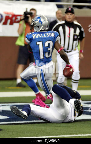 Detroit Lions Wide Receiver Nate Burleson (13) Is Tackled By Minnesota 