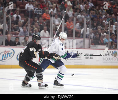 Oct 13, 2010 - Anaheim, California, U.S. - Vancouver Canucks defenseman KEVIN BIEKSA controls the puck from Anaheim Ducks left wing JASON BLAKE during the second period of an NHL hockey game at the Honda Center.  (Credit Image: © Mark Samala/ZUMApress.com) Stock Photo