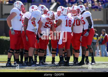 Oct. 16, 2010 - Greenville, North Carolina, United States of America - NC State huddles during the game between the East Carolina Pirates and the NC State Wolfpack at Dowdy-Ficklen Stadium.  The Pirates defeated the Wolfpack 33-27 in overtime. (Credit Image: © David Friend/Southcreek Global/ZUMApress.com) Stock Photo