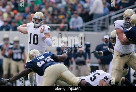 Oct. 23, 2010 - East Rutherford, New Jersey, United States of America - Norte Dame Junior Quarterback (#10) Dayne Crist attempts a pass under pressure. Navy defeats Notre Dame 35-17 at The New Giant's Stadium in East Rutherford New Jersey (Credit Image: © Saquan Stimpson/Southcreek Global/ZUMApress.com) Stock Photo