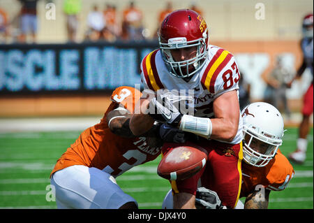 Oct. 23, 2010 - Austin, Texas, United States of America - Iowa State Cyclones wide receiver Jake Williams (83) fumbles the ball while being tackled during the game between the University of Texas and Iowa State. The Cyclones defeated the Longhorns 28-21. (Credit Image: © Jerome Miron/Southcreek Global/ZUMApress.com) Stock Photo