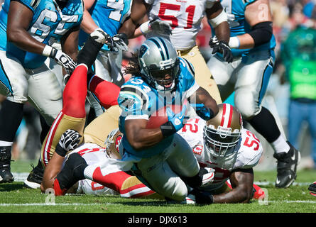 Oct. 24, 2010 - Charlotte, North Carolina, United States of America - Carolina Panthers running back DeAngelo Williams (34) is tackled by San Francisco 49ers linebacker Patrick Willis (52).The Panthers and 49er's are tied 10-10 at the half at Bank of America Stadium, Charlotte NC. (Credit Image: © Mark Abbott/Southcreek Global/ZUMApress.com) Stock Photo