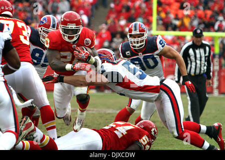 Oct. 31, 2010 - Kansas City, Missouri, United States of America - Kansas City Chiefs running back Thomas Jones (20) is hit by Buffalo Bills linebacker Paul Posluszny (51).  The Kansas CIty Chiefs defeat the Buffalo Bills 13-10 during overtime in the game at Arrowhead Stadium. (Credit Image: © Jacob Paulsen/Southcreek Global/ZUMApress.com) Stock Photo