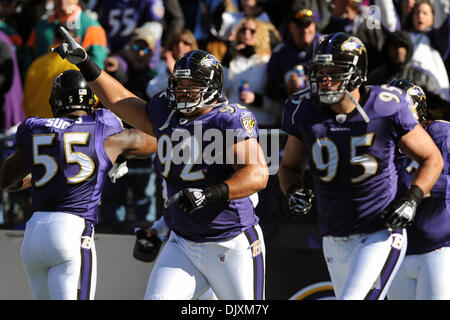 Baltimore Ravens' defensive tackle Haloti Ngata (92) runs the ball to the  Ravens' 7-yard-line after intercepting a pass from Tampa Bay Buccaneers'  quarterback Chris Simms during the second quarter at Raymond James