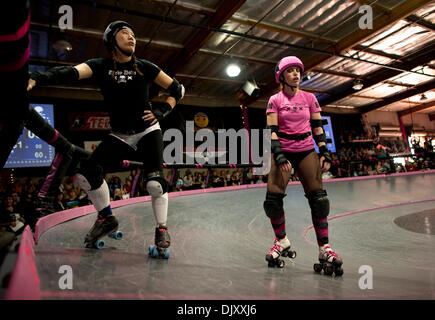 Nov. 14, 2010 - Los Angeles, California, USA -  The Baby Doll Brawl between the Karma Chameleons and the Church of the Poison Mind at the Doll Factory, headquarters and training facility for the L.A. Derby Dolls' 5-team, all female, banked track roller derby league.(Credit Image: © Brian Cahn/ZUMApress.com) Stock Photo