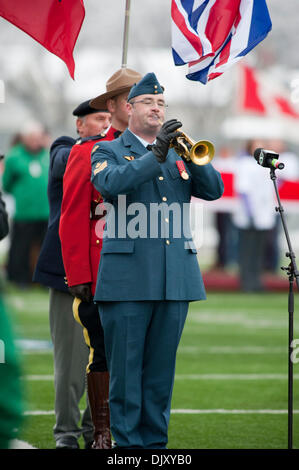 Nov. 14, 2010 - Regina, Saskatchewan, Canada - A bugler plays before the Saskatchewan RoughrIders vs B.C. Lions CFL Western Semi Final game at Mosaic Stadium in Regina. The Saskatchewan Roughriders defeated the B.C. Lions 41-38 in overtime (Credit Image: © Derek Mortensen/Southcreek Global/ZUMApress.com) Stock Photo