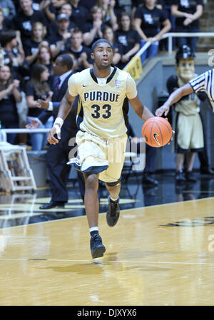 Nov. 14, 2010 - West Lafayette, Indiana, United States of America - Purdue's Sr. G  E'Twaun Moore (33) brings the ball up the Court  in the game between Purdue and Howard in Mackey Arena. (Credit Image: © Sandra Dukes/Southcreek Global/ZUMApress.com) Stock Photo