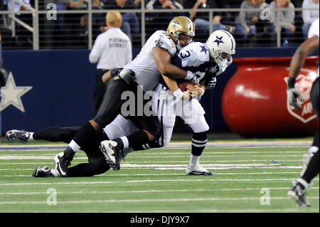 Nov. 25, 2010 - Arlington, Texas, United States of America - Dallas Cowboys quarterback Jon Kitna (3) is sacked by New Orleans Saints linebacker Jonathan Vilma (51) as the New Orleans Saints come back to defeat the Dallas Cowboys 30-27 at Cowboys Stadium in Arlington, Texas. (Credit Image: © Steven Leija/Southcreek Global/ZUMAPRESS.com) Stock Photo