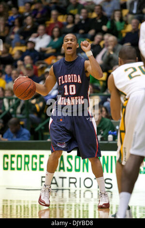 Nov. 27, 2010 - Fairfax, Virginia, United States of America - Florida Atlantic University Freshman Guard Dennis Mavin handles the ball against George Mason University at the Patriot Center Fairfax Virginia. George Mason defeated Florida Atlantic 66-51. (Credit Image: © Charles Barner/Southcreek Global/ZUMAPRESS.com) Stock Photo