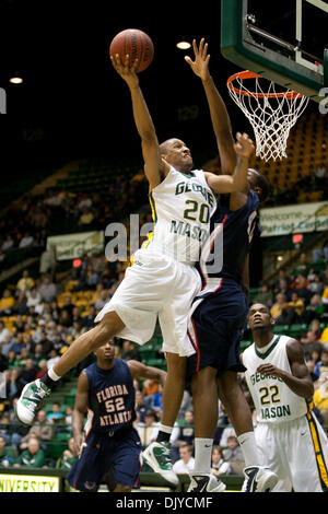 Nov. 27, 2010 - Fairfax, Virginia, United States of America - George Mason University Senior Guard Cam Long #20 is defended by Florida Atlantic University Senior Forward  Brett Royster #40. George Mason University defeated Florida Atlantic 66-51. (Credit Image: © Charles Barner/Southcreek Global/ZUMAPRESS.com) Stock Photo