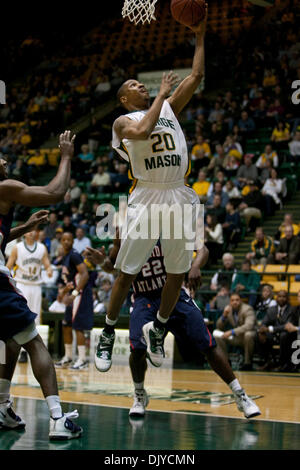 Nov. 27, 2010 - Fairfax, Virginia, United States of America - George Mason University Senior Guard Cam Long#20 score a basket against Florida Atlantic University at The Patriot Center. George Mason defeated Florida Atlantic 66-51. (Credit Image: © Charles Barner/Southcreek Global/ZUMAPRESS.com) Stock Photo