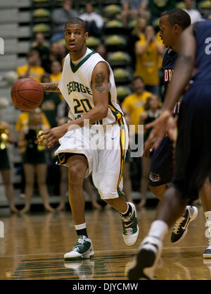 Nov. 27, 2010 - Fairfax, Virginia, United States of America - George Mason University Senior Guard Cam Long #20 is guarded by Florida Atlantic University Junior Guard Alex Tucker #5 at The Patriot Center. George Mason defeated Florida Atlantic 66-51. (Credit Image: © Charles Barner/Southcreek Global/ZUMAPRESS.com) Stock Photo