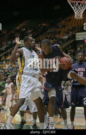 Nov. 27, 2010 - Fairfax, Virginia, United States of America - Florida Atlantic University Sophomore Guard Greg Gantt #22 brings down a rebound against George Mason University Junior Forward Mike Morrison #22 at the Patriot Center Fairfax Virginia. George Mason defeated Florida Atlantic 66-51. (Credit Image: © Charles Barner/Southcreek Global/ZUMAPRESS.com) Stock Photo