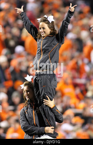 Nov. 27, 2010 - Stillwater, Oklahoma, United States of America - Cheerleader during game action.  Oklahoma defeats Oklahoma State at the Battle of Bedlam with a score of  47-41 in the game at Boones Pickens Stadium. (Credit Image: © Spruce Derden/Southcreek Global/ZUMAPRESS.com) Stock Photo