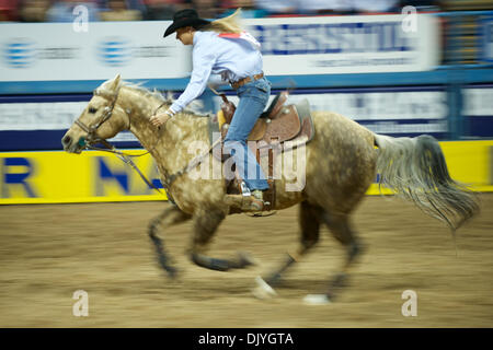 Dec. 2, 2010 - Las Vegas, Nevada, United States of America - Barrel racer Sherry Cervi of Marana, AZ put up a time of 14.30 during the first go-round at the 2010 Wrangler National Finals Rodeo at the Thomas & Mack Center. (Credit Image: © Matt Cohen/Southcreek Global/ZUMAPRESS.com) Stock Photo