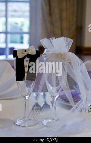 Two Champagne "Flute" glasses on the head table of the Bride and Groom's wedding. Stock Photo