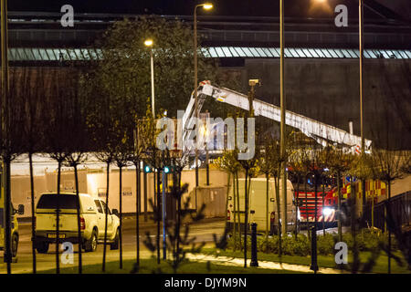 30th Nov 2013, Stockwell Street, Glasgow, Scotland, UK - Still a long way to go in the recovery effort as  a heavy crane arrives to recover the downed helicopter. Paul  Stewart/Alamy News Stock Photo