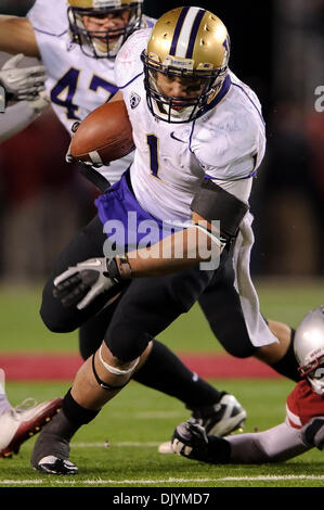 Dec. 4, 2010 - Pullman, Washington, United States of America - Washington Huskies running back Chris Polk (1) fights off Cougar defenders  during the game between Washington State and the University of Washington at Martin Stadium in Pullman, WA. Washington defeated Washington State 35-28. (Credit Image: © Steven Bisig/Southcreek Global/ZUMAPRESS.com) Stock Photo