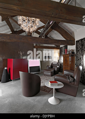 Interior room with leather armchairs and sofa Stock Photo - Alamy
