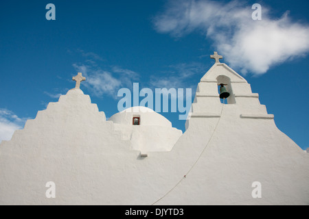 Greece, Cyclades group of islands, Mykonos, Hora. Typical whitewashed church rooftop with bell tower. Stock Photo