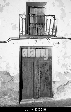 Full frame take of a weathered Mediterranean village house facade Stock Photo