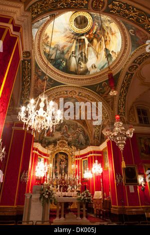 The interior of the parish church in the hamlet of Santa Lucia in Gozo in Malta. Stock Photo