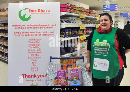 Soho, London, UK. 1st December 2013. A collection point in Tesco for Fareshare  a nationwide food collection to provide emergency food to more local people in crisis, being held on the 29th, 30th November and the 1st of December. Stock Photo