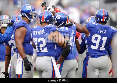 New York Giants defenders (91) Justin Tuck and (97) Kenderick Allen  celebrate a Dallas Cowboys turnover in week 13 at Giants Stadium in East  Rutherford, New Jersey on December 4, 2005. The