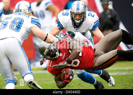 Tampa Bay Buccaneers safety Tanard Jackson (R) hits Seattle Seahawks tight  end John Carlson as he crosses the goal line in the seond quarter at Qwest  Field in Seattle on December 20