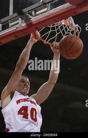 Dec. 23, 2010 - Madison, Wisconsin, U.S - Wisconsin forward/center JARED BERGGREN (40) dunks the basketball in first half action. The Wisconsin Badgers defeated the Coppin State Eagles 80-56 at the Kohl Cente. (Credit Image: © John Fisher/Southcreek Global/ZUMAPRESS.com) Stock Photo