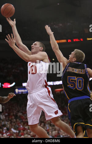 Dec. 23, 2010 - Madison, Wisconsin, U.S - Wisconsin forward/center Jared Berggren (40) drives in the middle of the lane for 2 of his 8 points in the game. Wisconsin Badgers defeated the Coppin State Eagles 80-56  at the Kohl Center in Madison, Wisconsin. (Credit Image: © John Fisher/Southcreek Global/ZUMAPRESS.com) Stock Photo