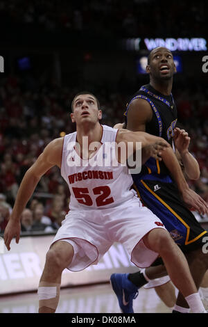 Dec. 23, 2010 - Madison, Wisconsin, U.S - Wisconsin forward Keaton Nankivil (52) blocks out Coppin State player on the shot. Wisconsin Badgers defeated the Coppin State Eagles 80-56  at the Kohl Center in Madison, Wisconsin. (Credit Image: © John Fisher/Southcreek Global/ZUMAPRESS.com) Stock Photo