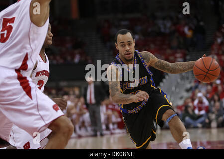 Dec. 23, 2010 - Madison, Wisconsin, U.S - Coppin State guard Tony Gallo (12) looks to drive on the play. Wisconsin Badgers defeated the Coppin State Eagles 80-56  at the Kohl Center in Madison, Wisconsin. (Credit Image: © John Fisher/Southcreek Global/ZUMAPRESS.com) Stock Photo