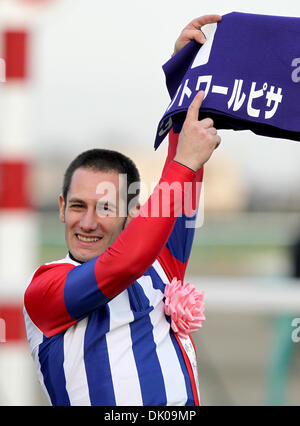 Dec. 26, 2010 - Chiba, Japan - Jockey MIRCO DEMUROÃŠaboard Victoire Pisa celebrates after winning the 55thÃŠArima MemorialÃŠat Nakayama racecourse on December 26, 2010 in Funabashi, Japan. (Credit Image: © Shugo Takemi/Jana Press/ZUMAPRESS.com) Stock Photo