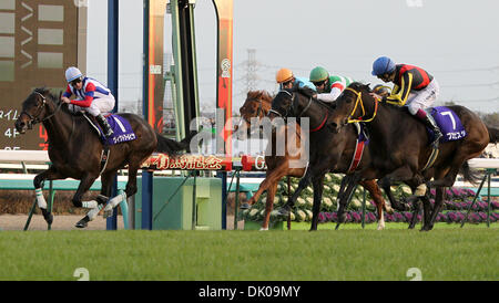 Dec. 26, 2010 - Chiba, Japan - Jockey MIRCO DEMURO aboard Victoire Pisa(L) crosses the finishing line in the first place during the 55th Arima Memorial at Nakayama racecourse on December 26, 2010 in Funabashi, Japan. (Credit Image: © Shugo Takemi/Jana Press/ZUMAPRESS.com) Stock Photo