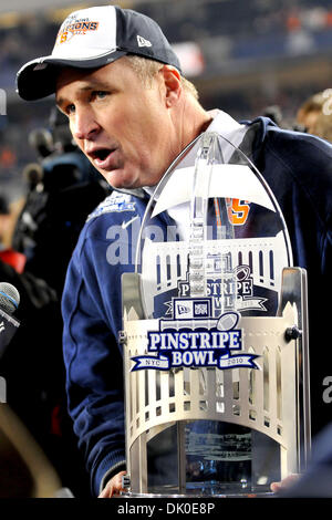 Dec. 30, 2010 - Bronx, New York, United States of America - Syracuse Orange head coach Doug Marrone with the Pinstripe Bowl Trophy...Final Score of the New Era Pinstripe Bowl at Yankees Stadium Kansas State Wildcats 34 and Syracuse Orange 36  (Credit Image: © Shane Psaltis/Southcreek Global/ZUMAPRESS.com) Stock Photo