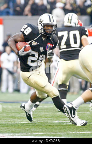 Dec. 31, 2010 - Memphis, Al, U.S - Georgia Bulldogs safety Bacarri Rambo  (18) makes an open field tackle on UCF Knights wide receiver Jamar Newsome  (9) during 2nd half action of