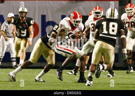 Dec. 31, 2010 - Memphis, Al, U.S - Georgia Bulldogs safety Bacarri Rambo  (18) makes an open field tackle on UCF Knights wide receiver Jamar Newsome  (9) during 2nd half action of