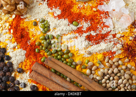 View of an assortment of spices and ingredients used in indian and other asian cuisines. Stock Photo