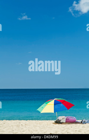 Colorful beach umbrella and floating 