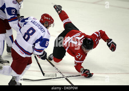 Jan. 5, 2011 - Buffalo, New York, U.S. - Team Canada forward CODY EAKIN (#21) dives for a loose puck during the first  period of the 2011 IIHF World Junior U20 Hockey Championships Gold Medal Game at HSBC Arena. (Credit Image: © Steve DeMeo/Southcreek Global/ZUMApress.com)