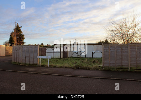 Boarded up post-war prefab on the Excalibur Estate, Caford, London. Lewisham Council is to demolish the 186 prefabs estate Stock Photo