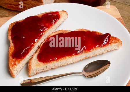 raspberry jam on toast Stock Photo