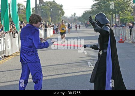 Jan 16, 2011 - Venice Beach, California, U.S. - Character actors stand in the course as thousands of runners participate in the 2nd annual 13.1 Marathon - Los Angeles and Karhu 5k Race. (Credit Image: © Ringo Chiu/ZUMAPRESS.com) Stock Photo