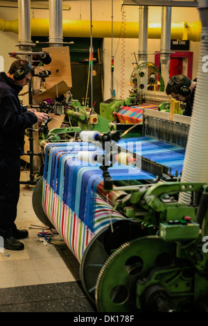 Modern weaving machine producing elaberate patterned textile for the World markets Stock Photo