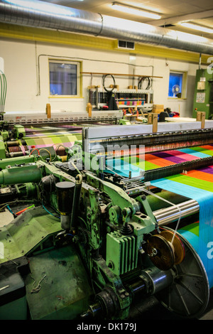 Modern weaving machine producing elaberate patterned textile for the World markets Stock Photo