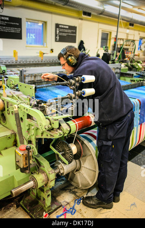 Modern weaving machine producing elaberate patterned textile for the World markets Stock Photo