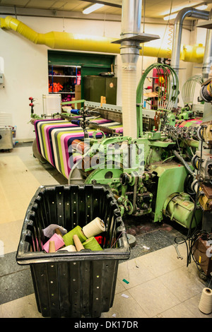 Modern weaving machine producing elaberate patterned textile for the World markets Stock Photo